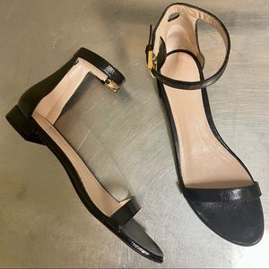Stuart Weitzman 20 Less Nudist shoes in Black Gleaming Tripon